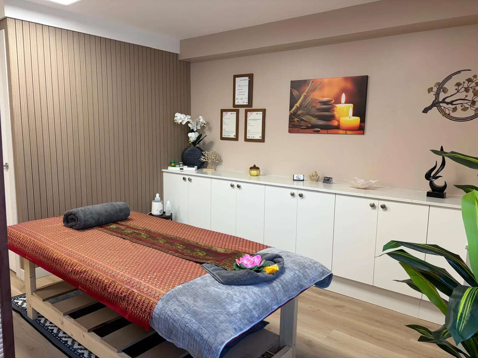Prepared massage table inside Saranya's peaceful Mapplewell treatment room
